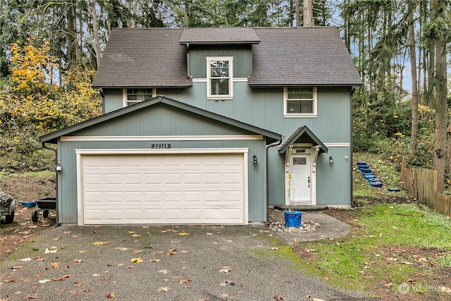 view of front property with a garage