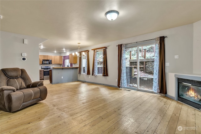 living room with light hardwood / wood-style flooring