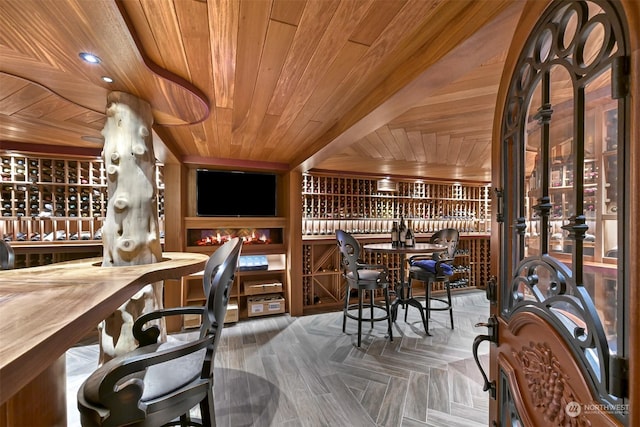 wine area with wood ceiling