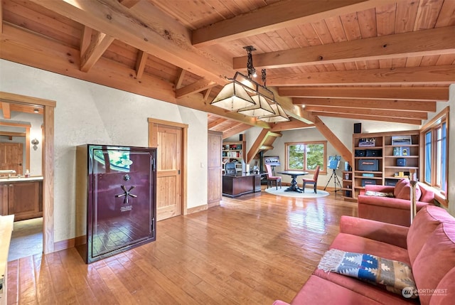 living room featuring lofted ceiling with beams, wood-type flooring, and wood ceiling