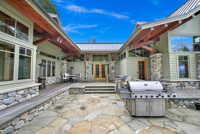 view of patio with a grill and french doors