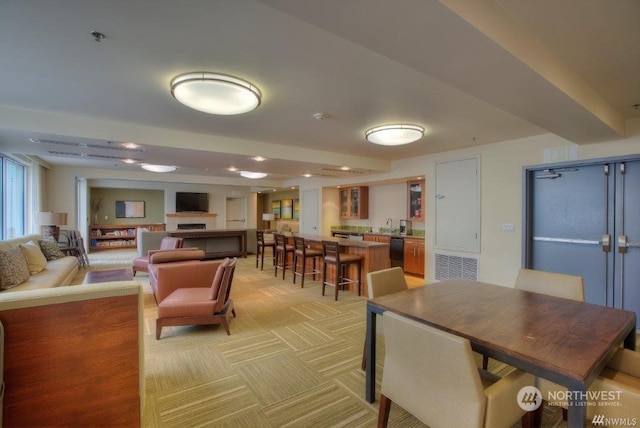 view of carpeted dining space