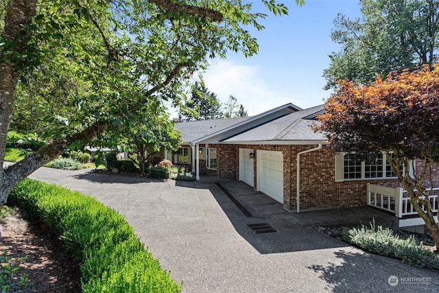 view of front of property with a garage