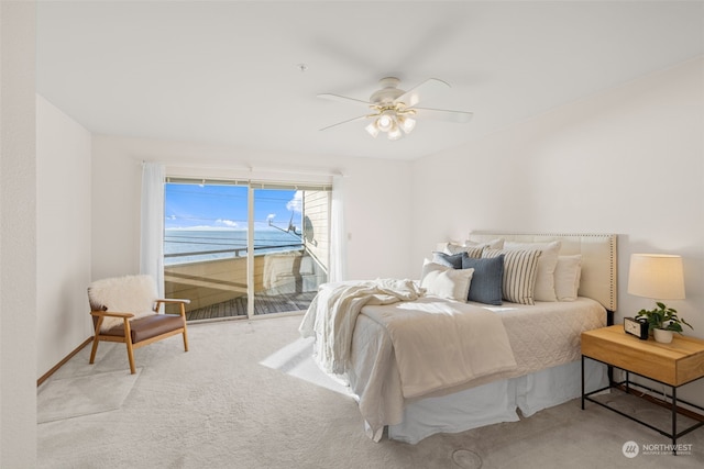 bedroom with ceiling fan, light carpet, and access to outside