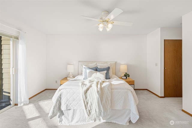 bedroom featuring ceiling fan and light colored carpet