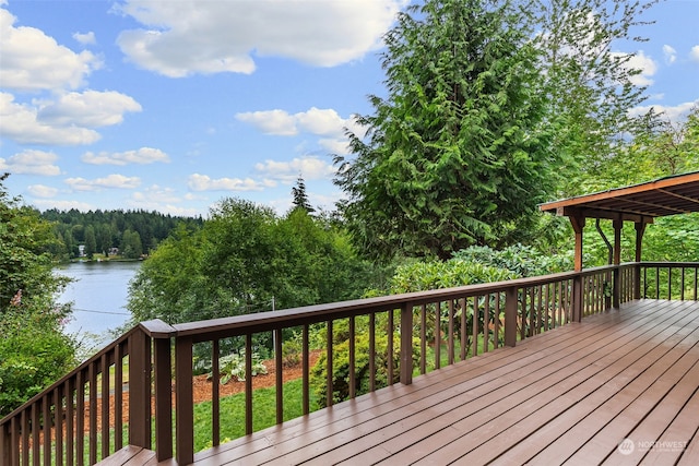 wooden deck with a water view