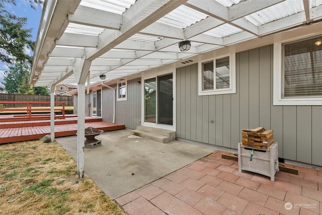 view of patio with a deck and a pergola