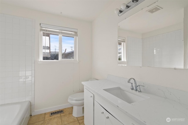 full bathroom with vanity, toilet, independent shower and bath, and tile patterned flooring