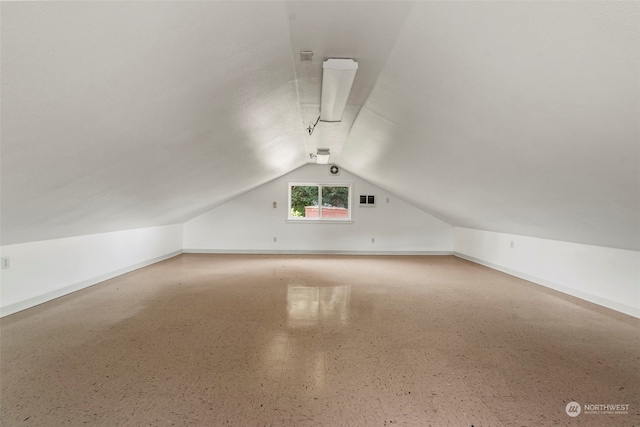 bonus room featuring vaulted ceiling