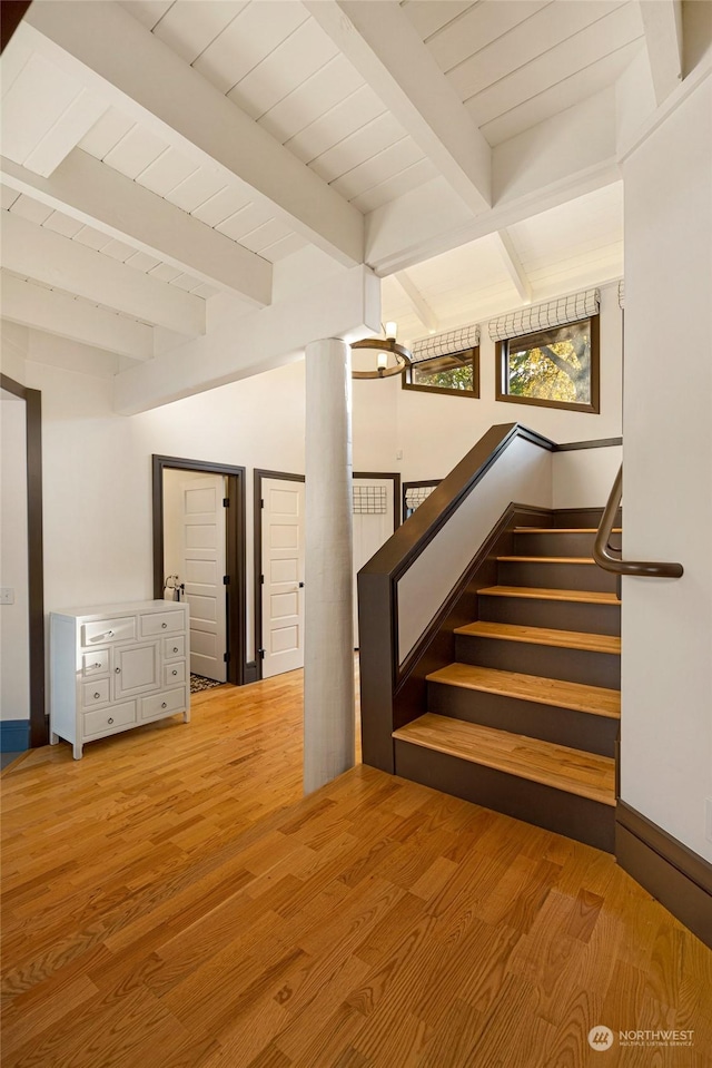470 Friday Ave, Friday Harbor, WA 98250 - staircase featuring wood finished floors and beam ceiling
