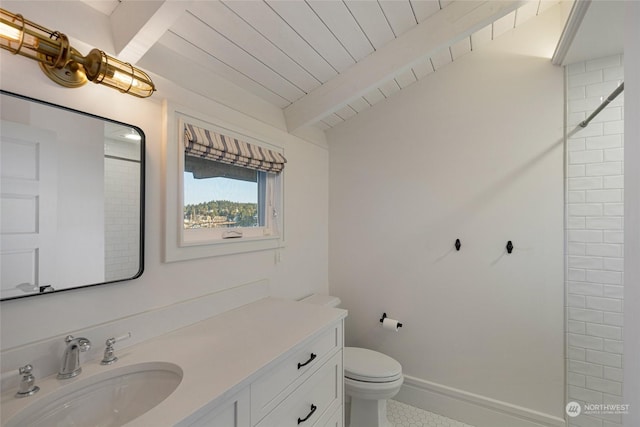 470 Friday Ave, Friday Harbor, WA 98250 - bathroom with lofted ceiling with beams, toilet, wood ceiling, vanity, and baseboards