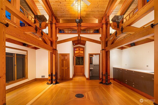 470 Friday Ave, Friday Harbor, WA 98250 - unfurnished living room with ceiling fan, visible vents, baseboards, parquet floors, and beam ceiling