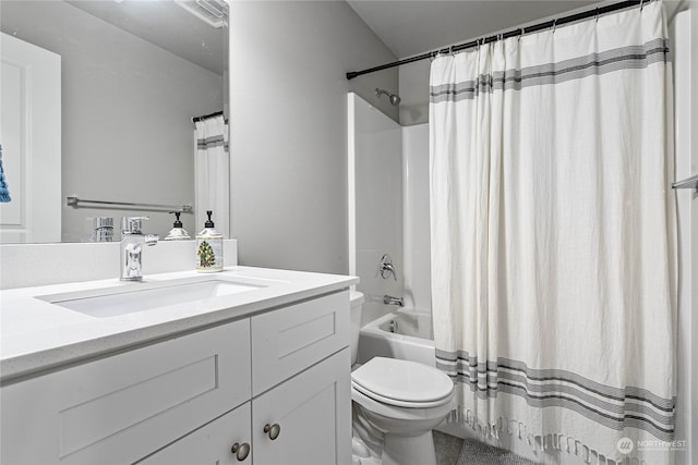 full bathroom with vanity, toilet, and shower / bath combo