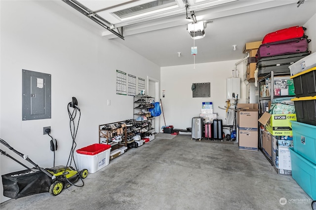 garage with a garage door opener and electric panel