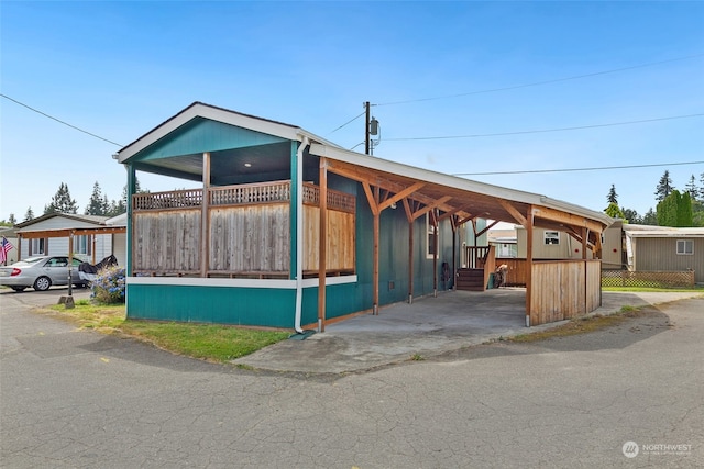 manufactured / mobile home with a carport