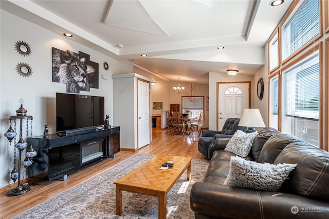 935 Sunrise Dr, Manson, WA 98831 - living room with a chandelier, light wood finished floors, recessed lighting, and baseboards