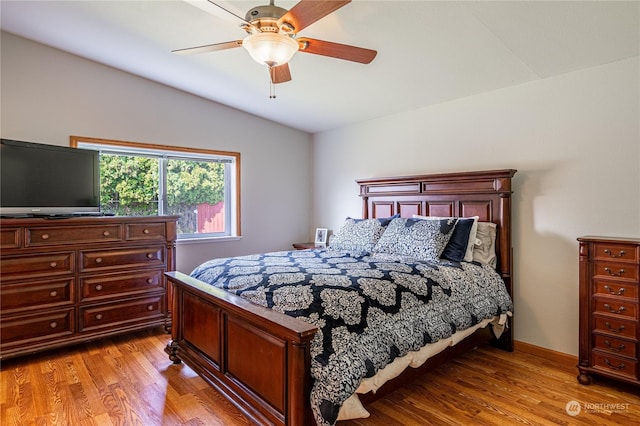 935 Sunrise Dr, Manson, WA 98831 - bedroom featuring lofted ceiling, light wood-type flooring, and a ceiling fan