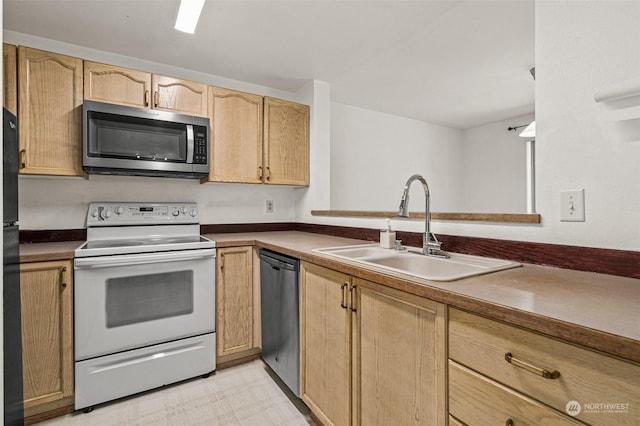 kitchen featuring sink, refrigerator, light brown cabinets, white electric stove, and dishwasher