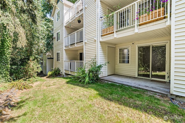 exterior space with a yard and a patio