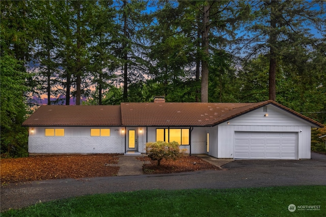 view of front of home with a garage