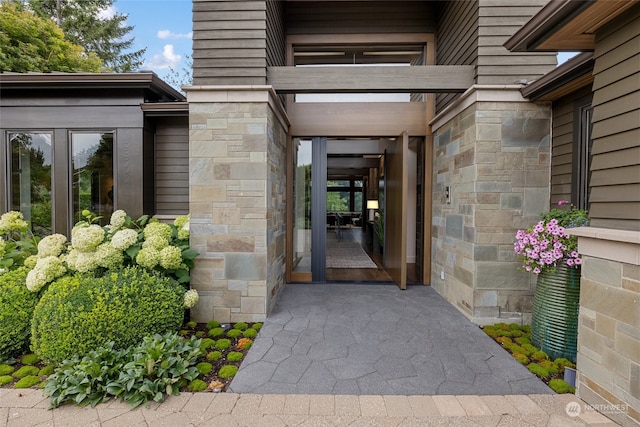 doorway to property featuring french doors