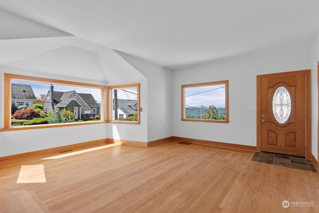 entrance foyer with light hardwood / wood-style floors