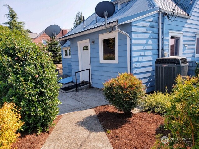 view of property exterior featuring cooling unit