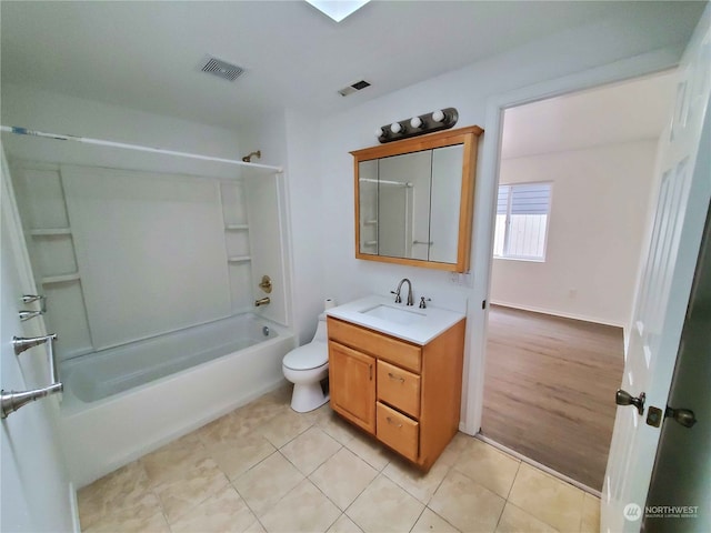 full bathroom with shower / washtub combination, toilet, tile patterned flooring, and vanity