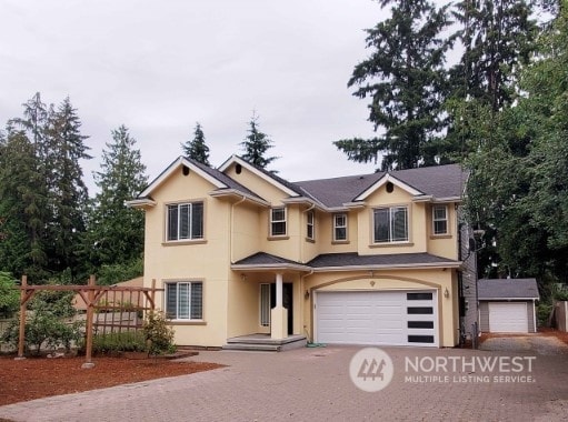 view of front of home featuring a garage