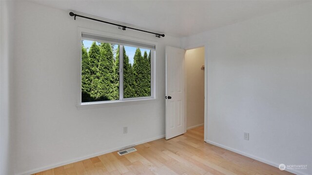 empty room featuring light hardwood / wood-style flooring