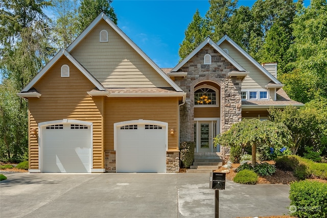 view of front of property with a garage