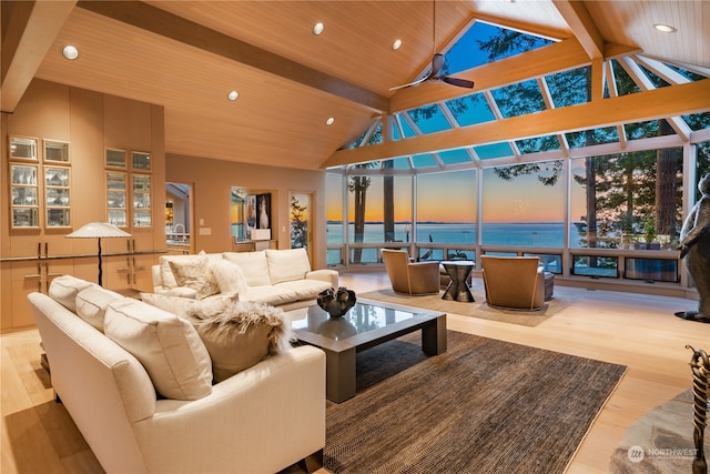 living room featuring wood ceiling, light hardwood / wood-style floors, a water view, beam ceiling, and ceiling fan