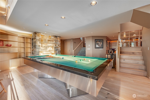 game room with built in shelves, light hardwood / wood-style flooring, and billiards