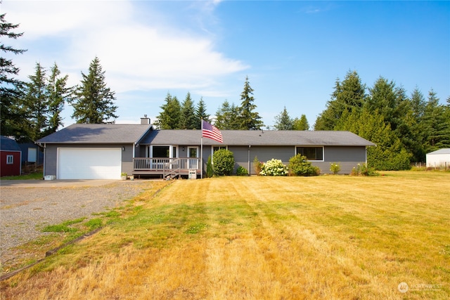 ranch-style home featuring a front yard