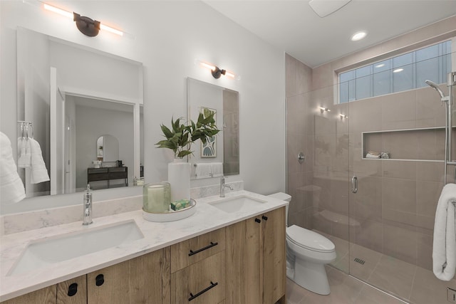 8045G Mary Ave NW, Seattle, WA 98117 - full bathroom with toilet, a stall shower, tile patterned floors, and double vanity