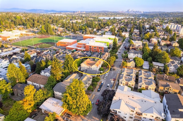 birds eye view of property with a residential view