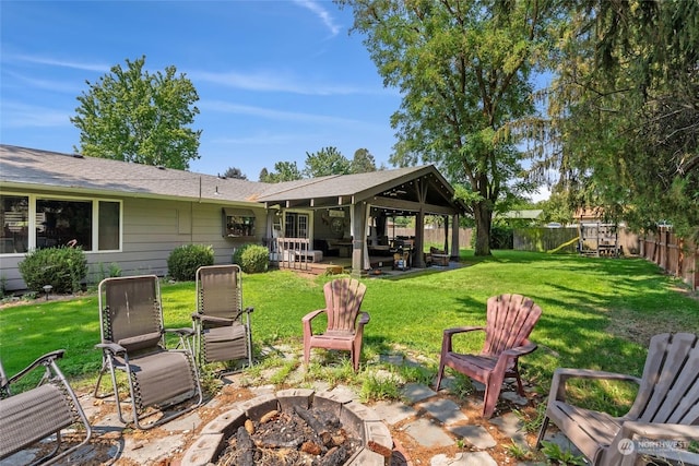 view of patio featuring a fire pit