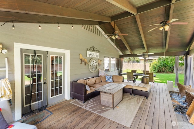 wooden terrace with outdoor lounge area and ceiling fan