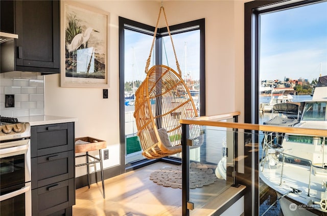 interior space with light hardwood / wood-style floors and plenty of natural light