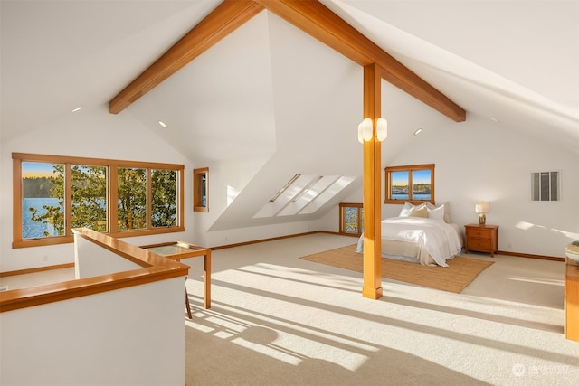 carpeted bedroom with high vaulted ceiling and beam ceiling