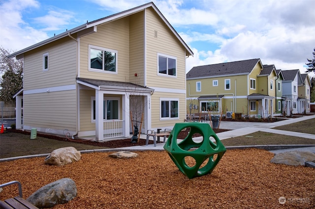 rear view of property with a patio