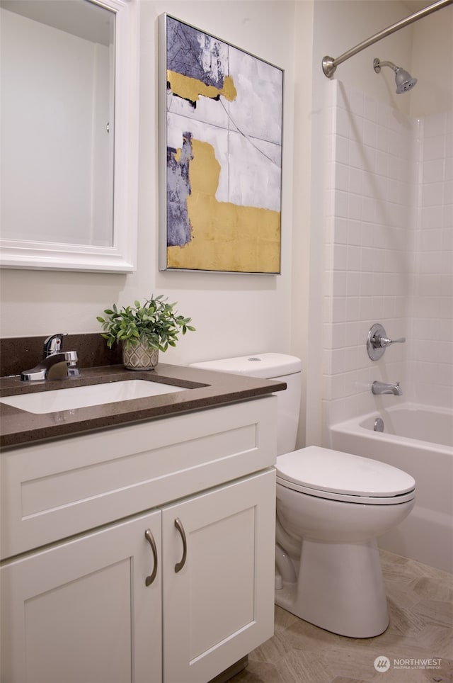 full bathroom featuring shower / bathing tub combination, vanity, and toilet