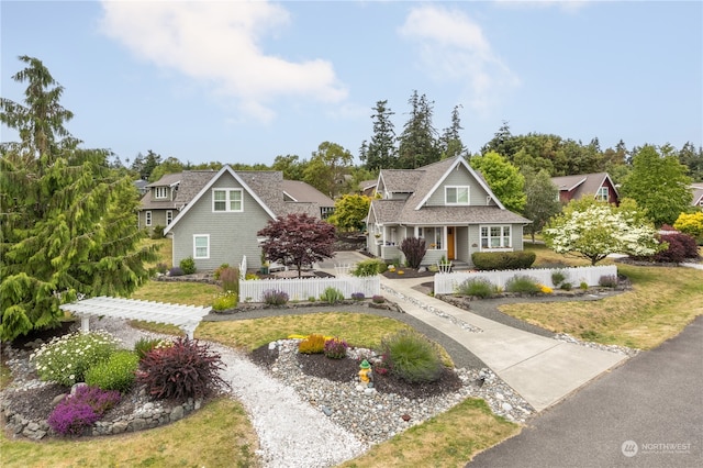 view of front of home with a front lawn