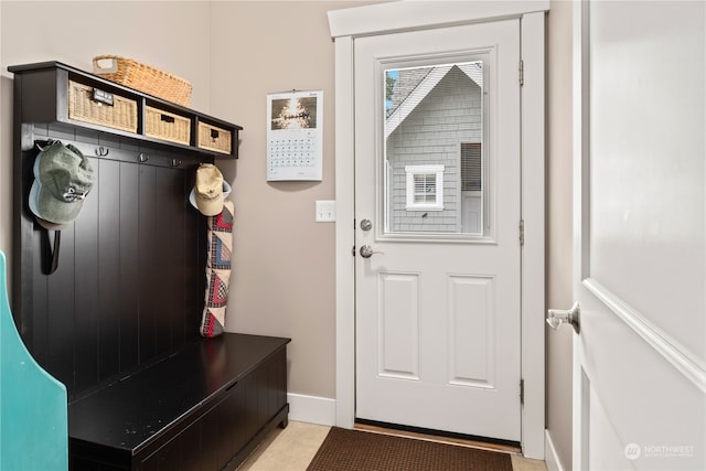 mudroom featuring light tile patterned flooring