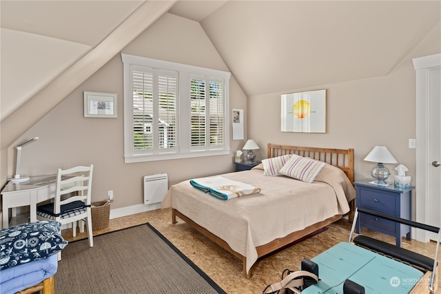 carpeted bedroom featuring vaulted ceiling