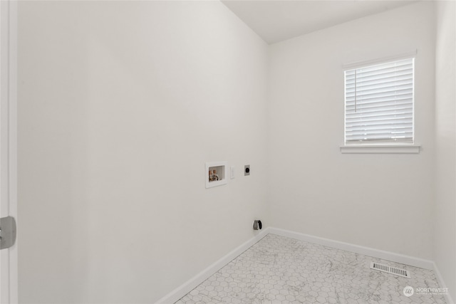 laundry area featuring hookup for a washing machine and hookup for an electric dryer