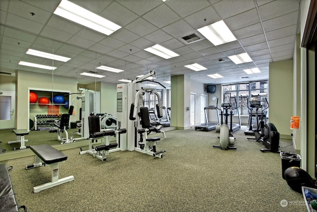 gym with a drop ceiling