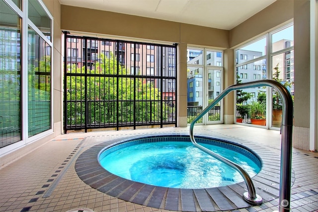 view of pool with an indoor in ground hot tub