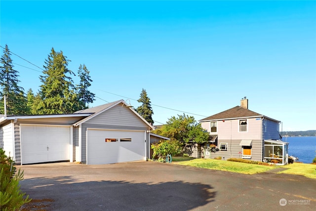 garage featuring a water view