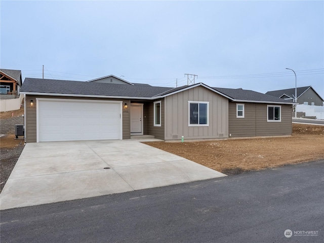 single story home featuring a garage